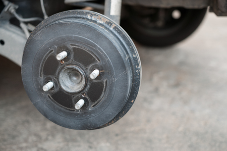 Dirt wheels without tire, car fix in the garage.