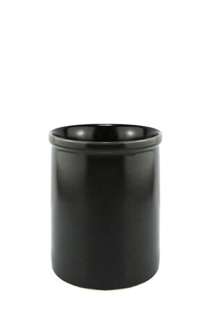 Black cup with wooden spoon isolated on white background.の写真素材