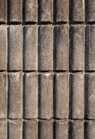 Old cylinder concrete wall pattern background with shade of sunlight and shadow.の写真素材