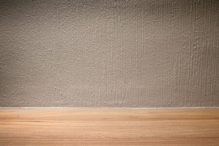 Empty wall background. Texture wall and wooden floor.の写真素材