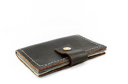 Leather wallet handmade isolated on white backgroundの写真素材