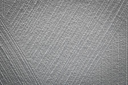 Defocused, Scratched concrete wall with brass hard brush. Scratched curved on concrete wall texture background.の写真素材