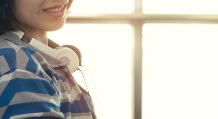 Happiness of Asian woman with headphone  for listening to the musicの写真素材