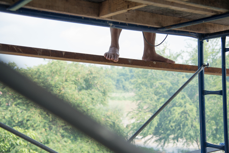 Close up man legs of Construction site worker.の写真素材