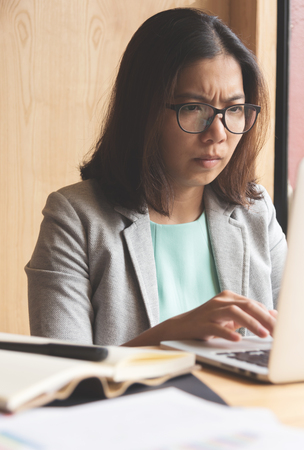 Asian Business woman working at the office.の写真素材