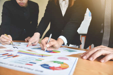 Business People are discussing with chart or graph documents at meeting. Teamwork.の写真素材