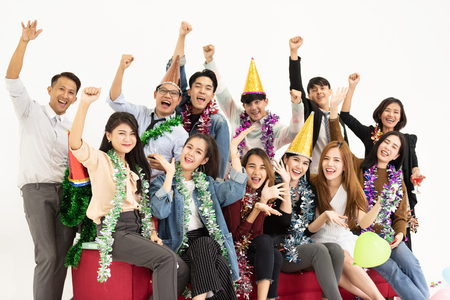Cheerful of Young Business people celebrating on white background.の写真素材