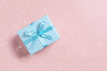 Top view of blue gift boxes on pink isolated background with copy space. Christmas, Birthday and New year concept.の写真素材
