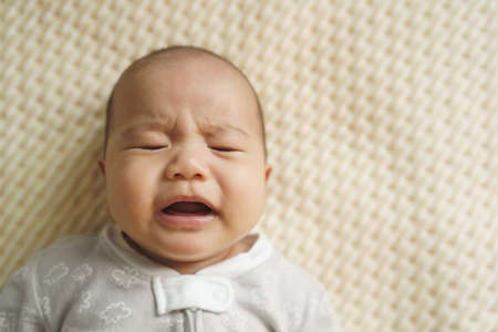 Asian baby boy crying, Sadness emotions, Feeling sadの写真素材