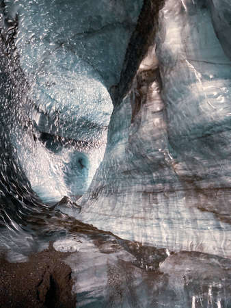 impressive view into a glacier cave in icelandの写真素材