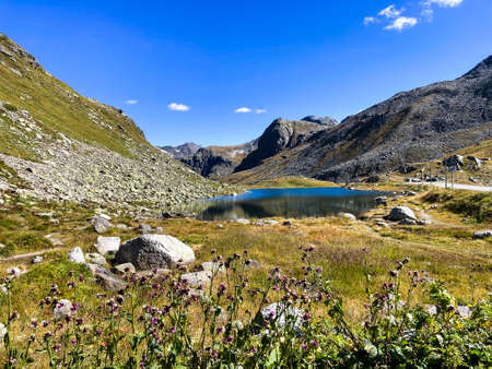 View to a Lake on the Flueelapass in Switzerlandの写真素材