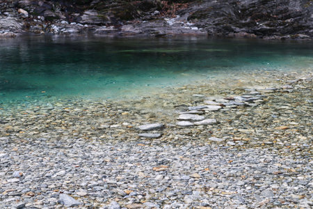 The Maggia River flowing through the Maggia Valley in the Ticino in Switzerlandのeditorial素材