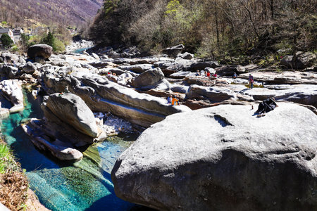 Lavertezzo, Switzerland, 10. April 2022: Tourquise clear Verzasca River in Lavertezzo, Ticino, Switzerlandのeditorial素材