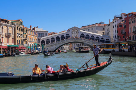 Venice, Italy, 11. June 2022: Gondola, Canal Grande and Rialto Bridge in Venice, Italy.のeditorial素材