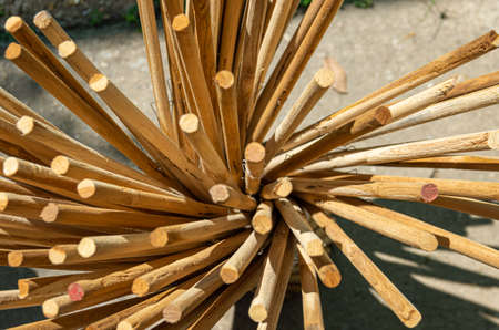Collection of wooden sticks for umbrellas - close up - selected focus