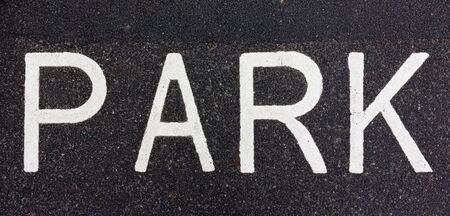 Parking sign painted on the road with white paintの写真素材