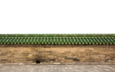 Brick sandstone wall with green glazed roof tiles in Chinaの写真素材