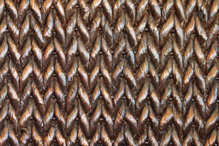 Closeup of a Brown Woven Basket with Chevron Pattern