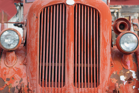 Weathered Grill of a Red Vintage Fire Truckの写真素材
