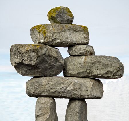 Inuksuk - A Stone Sculpture in the form of a person - along the road in Canadaの写真素材