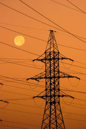 sunset with power lines and moon