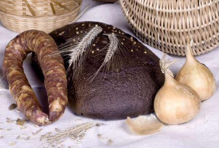 The smoked sausage and loaf breadの写真素材