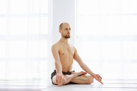 Man practicing advanced yoga. A series of yoga poses. Lifestyle concept