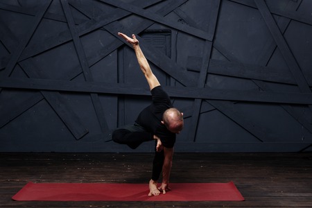 Man practicing advanced yoga. A series of yoga poses. Sport concept