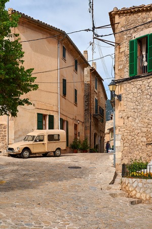 Old European street decorated with fresh flowers city of Valldemossa. Palma de Mallorca. Spain.の写真素材