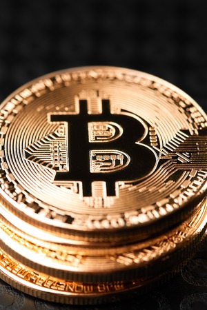 Bitcoins and Virtual money. Golden Bitcoins. Concept worldwide cryptocurrencyの写真素材