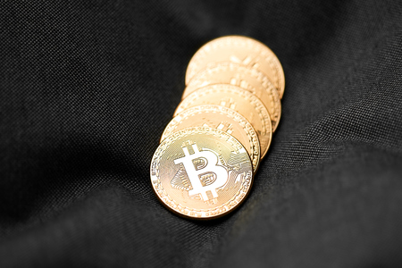 Bitcoins and Virtual money. Bitcoin gold coin. Cryptocurrency concept.の写真素材