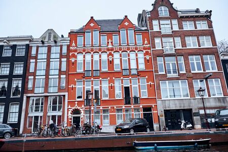 Amsterdam, Netherlands - November 22, 2017: The architecture of the historic center of Amsterdam along the canalsのeditorial素材