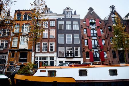 Amsterdam, Netherlands - November 22, 2017: The architecture of the historic center of Amsterdam along the canalsのeditorial素材