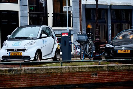 Amsterdam, Netherlands - November 22, 2017: Power supply for electric car charging. Electric car charging stationのeditorial素材