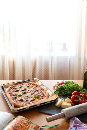 Homemade Margarita Flatbread Pizza with Tomato and Basilの写真素材
