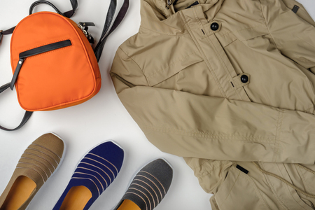 Beautiful casual woman fashion set with jacket and shoes on white background.の写真素材