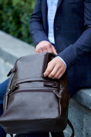Businessman style. Men style. Young businessman with backpack.の写真素材