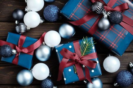 Christmas decorations and Christmas gifts on an old wooden table. Christmas background. New year 2019の写真素材