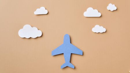 Handicraft from colorful paper Airplane and cloudsの写真素材