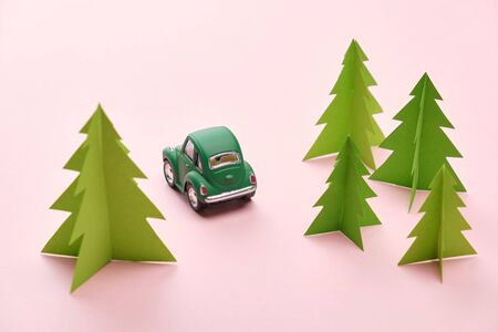 Retro car on trendy colored paper. Paper cut.の写真素材