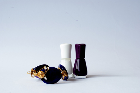 Nail polish with a purple braceletの写真素材