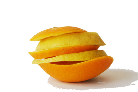 Fresh tasty colorful closeup orange and lemon in a white backgroundの写真素材