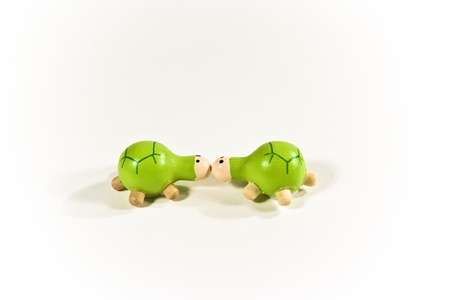 two little kissing green turtles  の写真素材