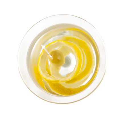 upper view of martini with olive and lemon in special martini glass  isolated on white background and shallow dept of field の写真素材