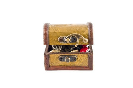 wooden treasure chest with jewellery in it, isolated on white background