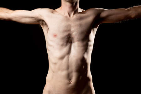 A skinny muskular man with funnel or sunken chest, better known in medicine as Pectus Excavatum. Front view with open arms.の写真素材