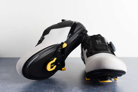 Pair of road cycling shoes with the automatic cleats assembled.の写真素材