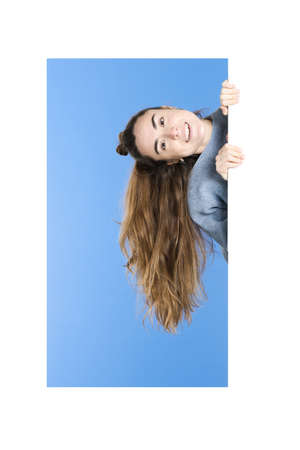 Woman in horizontal position with the long hair hangingの写真素材