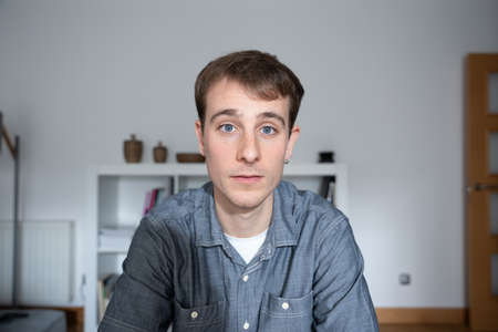 Webcam view of young man. Homeschooling and video call conceptの写真素材