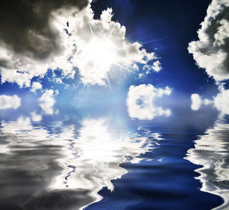 oceanview with sunshine and clouds backgroundの写真素材